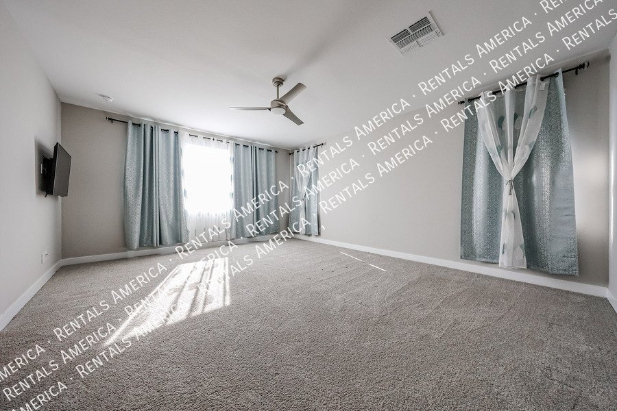 Exquisite 4BR/3BA + Loft Home in Mariposa Gated Community, Chandler property image