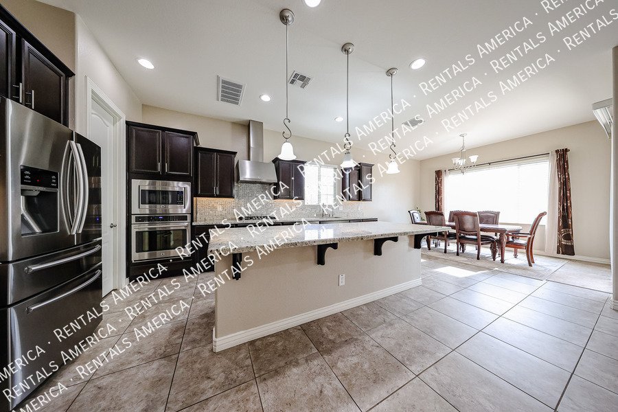 Spacious 4-Bedroom Home with Pool & Home Theater in Layton Lakes property image