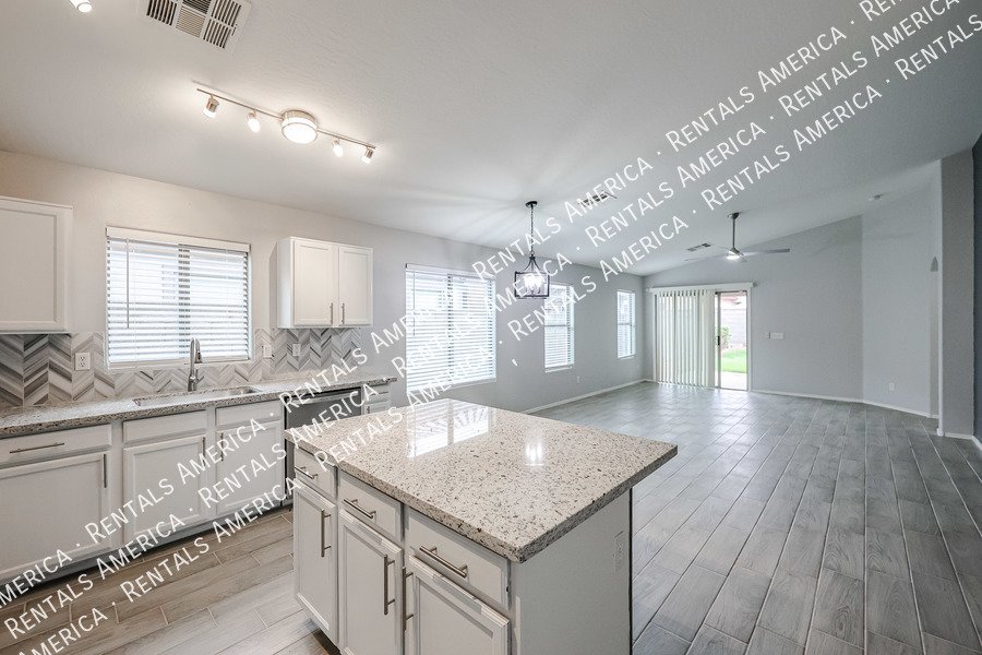 MI Special! Beautiful 4BD 2BA Home in Maricopa Meadows! property image