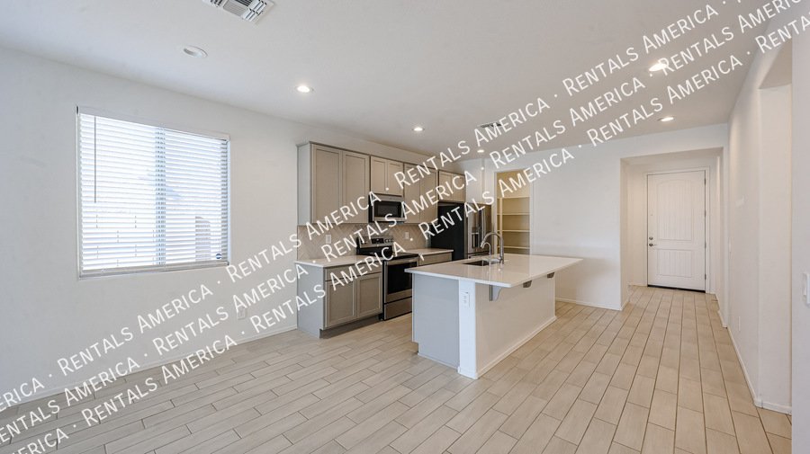 Check out this spacious, stylish, & functional Goodyear home! property image