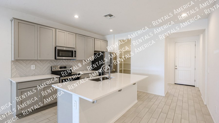 Check out this spacious, stylish, & functional Goodyear home! property image