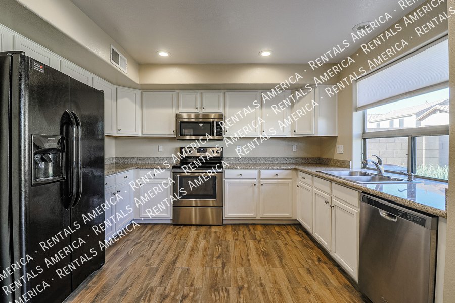 Beautiful 4/2.5 Home in Wigwam North ~ Move in Ready NOW! property image